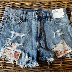 AERO-sz 0- vintage high rise shorty embroidered pocket spring break